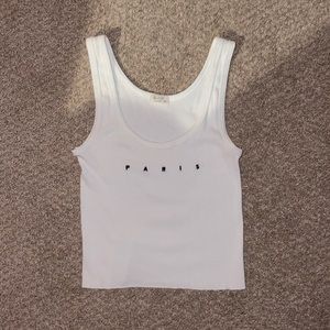 White Paris tank top, from Brandy Melville.
